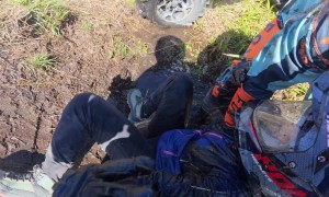 ATV Traps Riders After Flipping