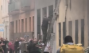 People Escape Burning Building
