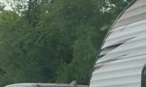 Camping Woman Rides Comfortably In Truck Bed