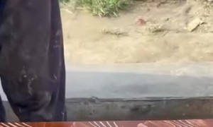 Man Designs Swirled Table Top