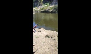 Young Fisherman Gets a Unique Catch