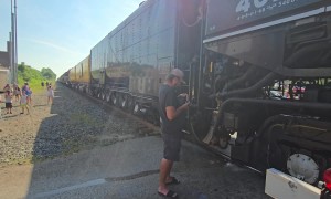 Locomotive Engineer Scolds Photographer for Standing on the Tracks
