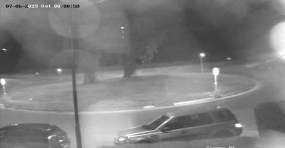 Fleeing Car Flies Over Roundabout - Sharedots