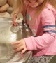 Little Girl Vs. Drinking Fountain