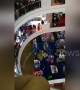 Shoppers flee in panic as mall floods following heavy rain