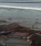 Tsunami Crashes into Indonesian City