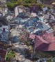 Aerial footage shows houses flattened, piles of debris littered on earthquake-stricken Indonesia island
