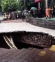 Huge sinkhole swallows up passersby on street in China