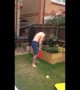 Dad get smacked in the face twice during family swingball game