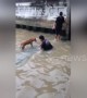 Brave teenagers rescue stray dog stranded in dirty canal