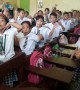 Primary school children give teacher a very enthusiastic morning greeting