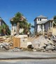 Piles of debris from flattened houses lie on side of Mexico Beach roads
