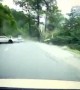 Dramatic footage shows large boulder rolling down hill and smashing car in southeast Tibet