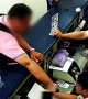 Chinese man slaps airport worker in face with iPhone after flight cancelled