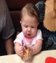 Baby has Epic Battle with Cookie Wrapper