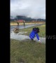Girl takes spectacular fall in muddy puddle