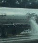 Fuel Tanker Spills its Load onto Highway