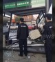 Out-of-control car ploughs into security booth injuring two