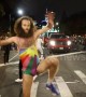 Man in woman’s bathing suit performs striptease dance at NYC Halloween parade