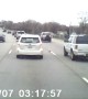SUV Inches Away from Hitting Parked Police Car