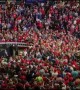 Trump pauses speech, crowd sings Amazing Grace during rally as elderly woman receives medical help