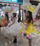 Models demonstrate unique balloon dresses at Chinese mall