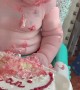 Infant Nods Off During Birthday Cake Feast