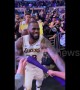 Young fan freaks out when LeBron hands his arm sleeve to him