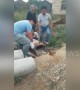 Boy trapped in concrete pipe is smashed out by his dad