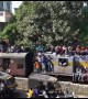 Indian pilgrims surf train in huge numbers en route to holy festival
