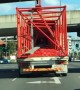Truck on the highway gives an illusion-like shadow performance