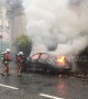 Firefighters extinguish blazing car during Paris "yellow vests" protest