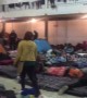 Migrants relocated to new shelter at Tijuana border