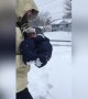 Video of baby sinking in 20-inch snow goes viral