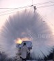 Woman makes amazing ice halo in the air with boiling water