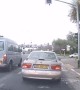 Cyclist has insanely close call with turning vehicle
