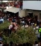 Indian villagers jump into huge pile of thorns from rooftops in bizarre ritual