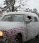 Car Covered in Cups