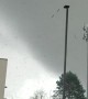 Tornado Debris Floats Through Stormy Sky