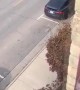 Man moves his car from office window
