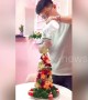 Romantic husband makes edible fruity Christmas tree for his wife