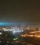View from flight shows eerie blue grow lighting up New York City sky after transformer explosion