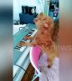 Smart poodle shows off piano and singing skills on command