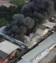 Dramatic drone footage shows massive plumes of black smoke from Thailand warehouse fire