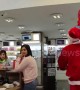 Santa 'drops' presents on people in holiday prank