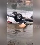Man saves father and daughter trapped in car after vehicle loses control and dives into pond in southern China
