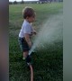 Kids Playing in the Sprinklers
