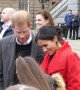 Meghan and Harry cuddle crying schoolgirl on first joint engagement of 2019