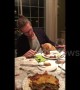 Cat crashes dinner party, licks food then gleefully runs away