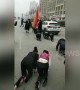 Chinese employees crawl along road as punishment for not reaching target